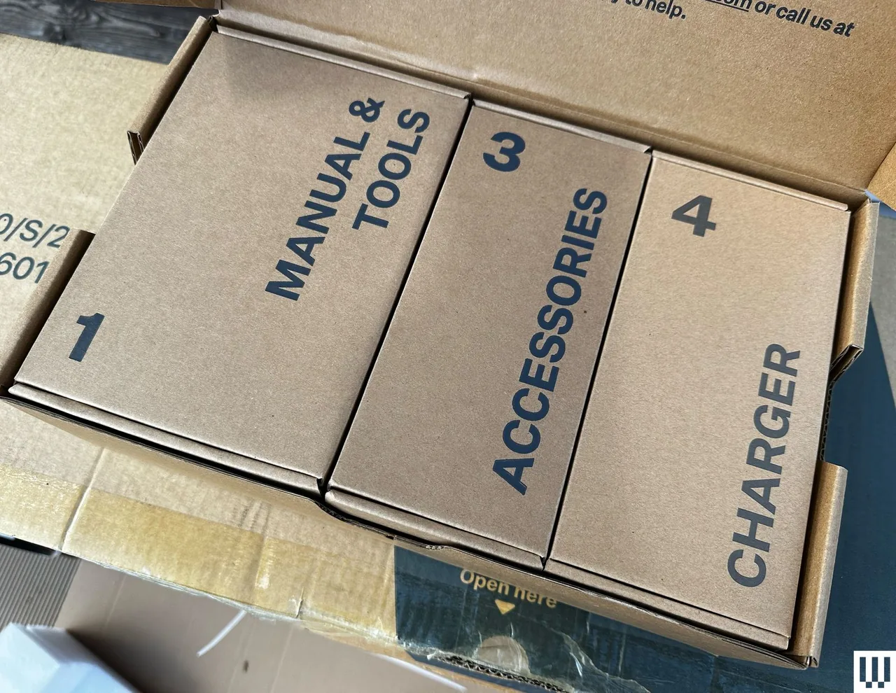 Image may contain Box Cardboard Carton Package Package Delivery Person Text and Symbol